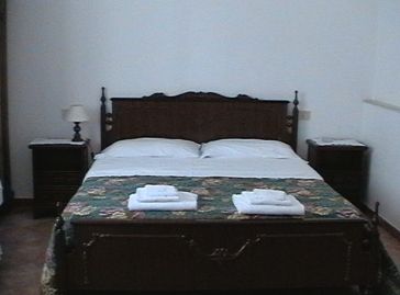 ingrandisci