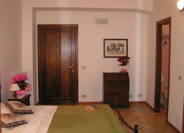 ingrandisci