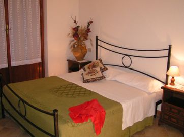 ingrandisci